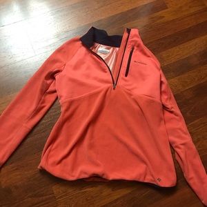 A pinkie-orangie Jacket, with sparkle look inside